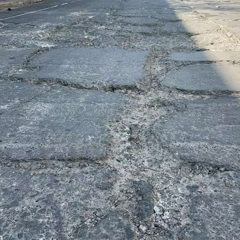 万荣路面起砂露石子修补料